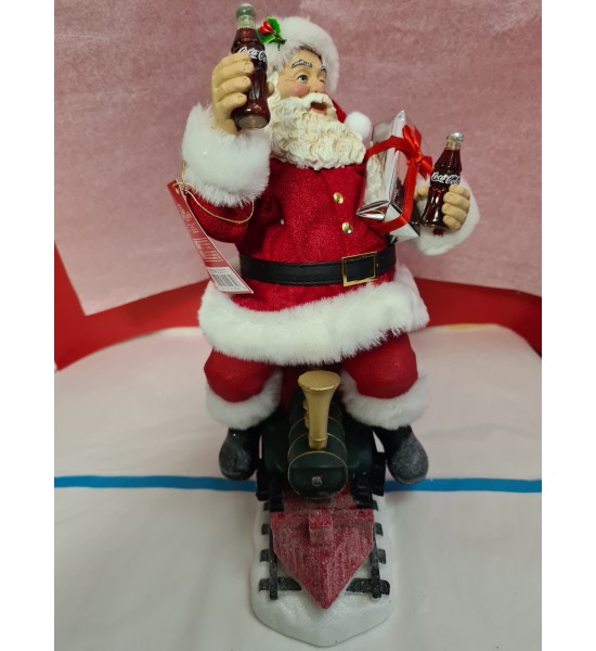 Père Noël Coca Cola sur une Locomotive